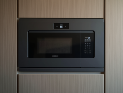 create_a_high-resolution_image_of_a_built-in_modern_microwave_in_dark_gray_metallic_color_with_a_mi_qvlmk2c3lah6tsf7w7pg_2