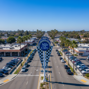 ultra-wide_aerial_drone_photography_of_the_iconic_national_city__mile_of_cars_landmark_sign_in_nati_kb8yvkgg8ewqgin35866_1