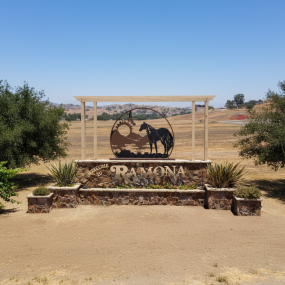 ultra-wide_aerial_drone_photography_of_the_welcome_to_ramona_monument_sign_in_ramona_california_cle_la1mev59bip787dklm8m_1