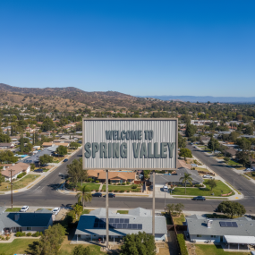ultra-wide_aerial_drone_photography_of_the_welcome_to_spring_valley_sign_in_spring_valley_californi_naxlg3c0q0dtshehm69h_1